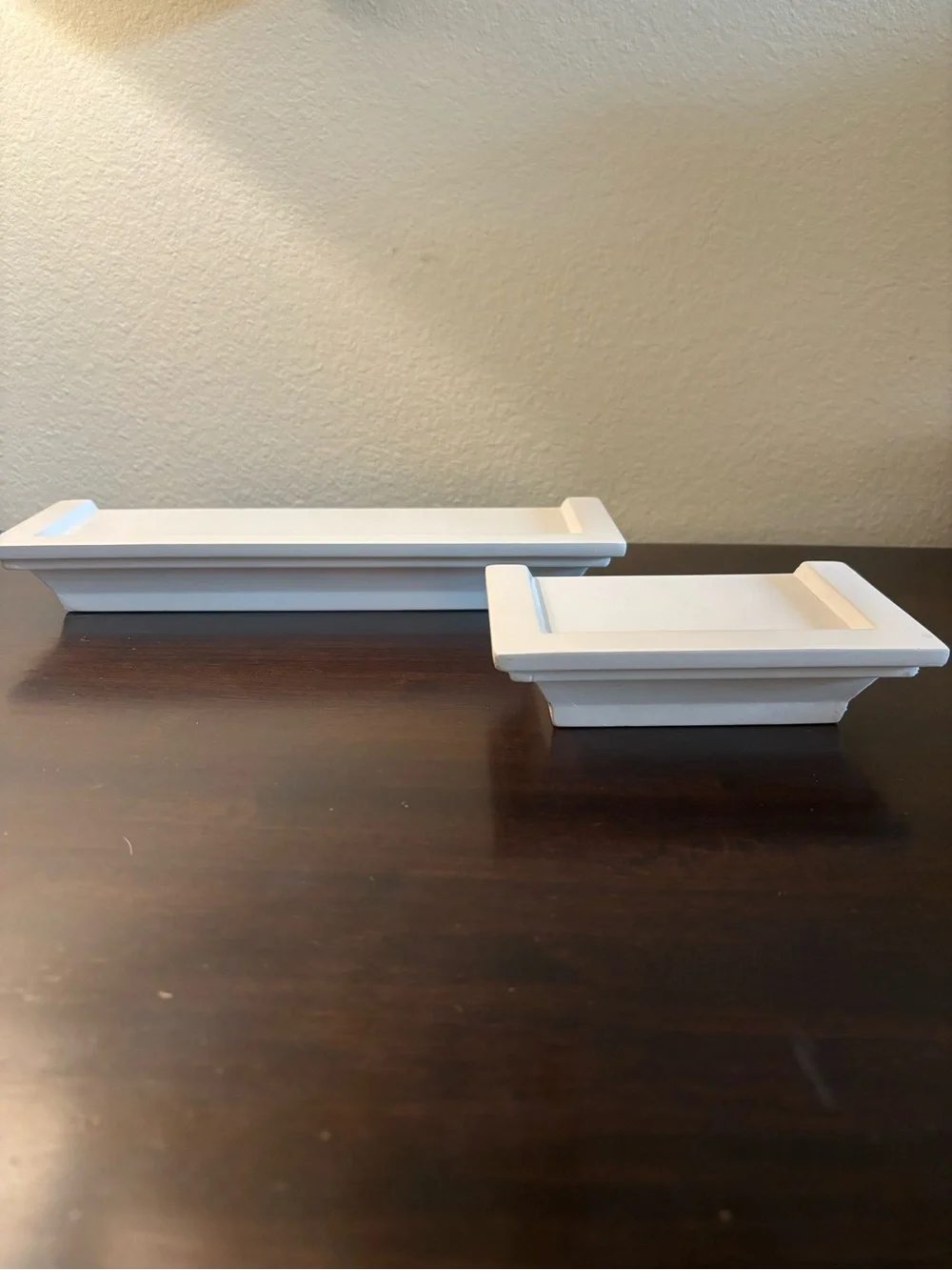 Set of 2 white matching wall shelves